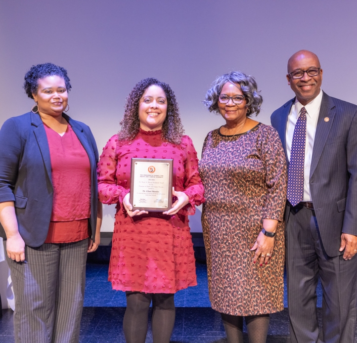 Image depicting 2024 award recipient of Muriel A. Howard Presidential Award. From left to right interim CDO, Lisa Fronckowiak, Dr. Morales, interim president Dr.Durand, interim VP of student affairs Dr. Brumfield