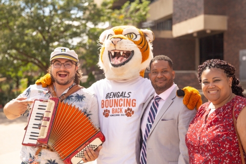 Photo of Bengi and Staff (Lisa Morrison and LeVar Burke)